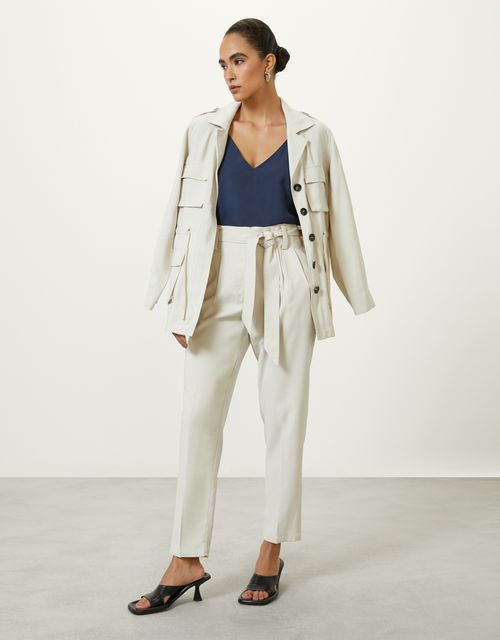 Calça slim com faixa natural