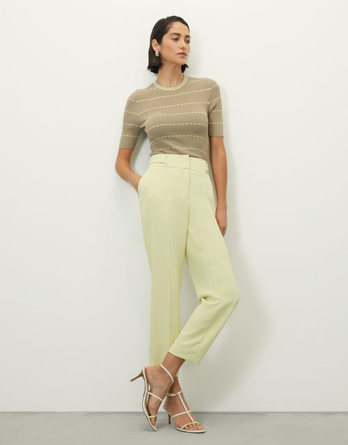 Calça slim vincada