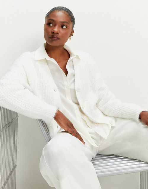 Cardigan tricot pelinhos