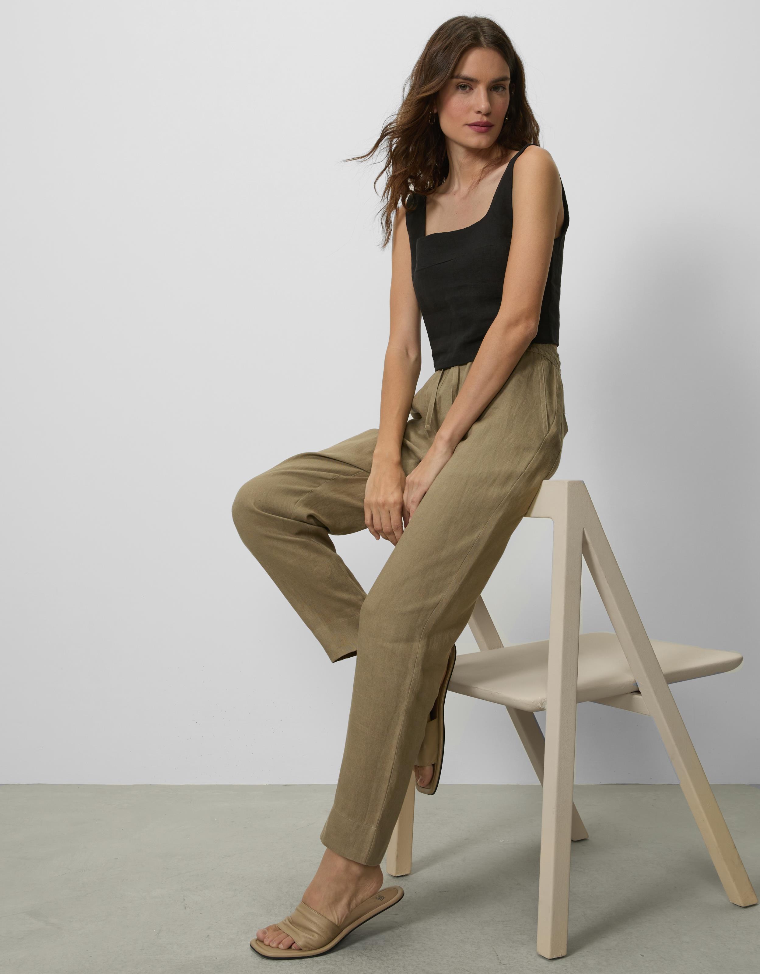 Calça slim elástico cós