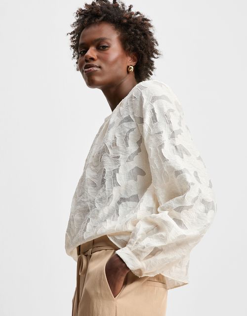 Blusa jacquard pregas